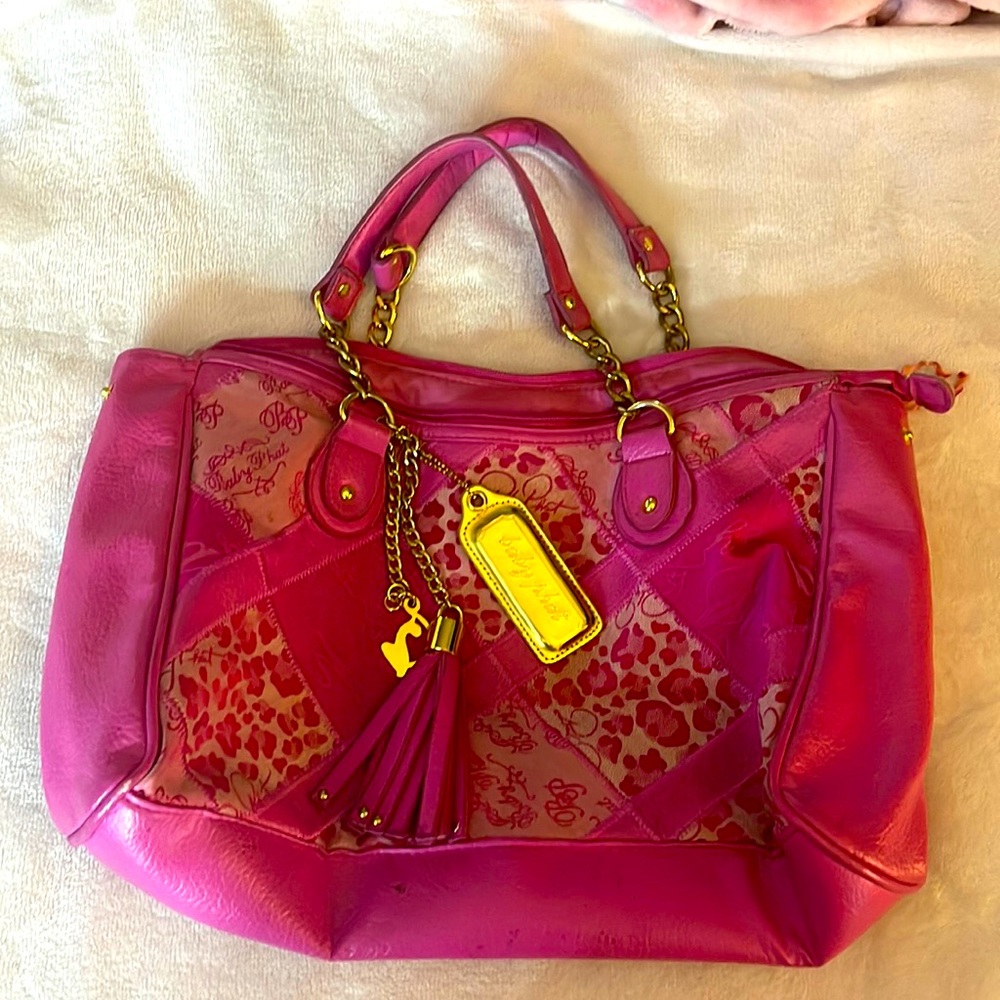 Sexy Cute Bag. One of a Kind. It’s definitely a Collectors Bag.